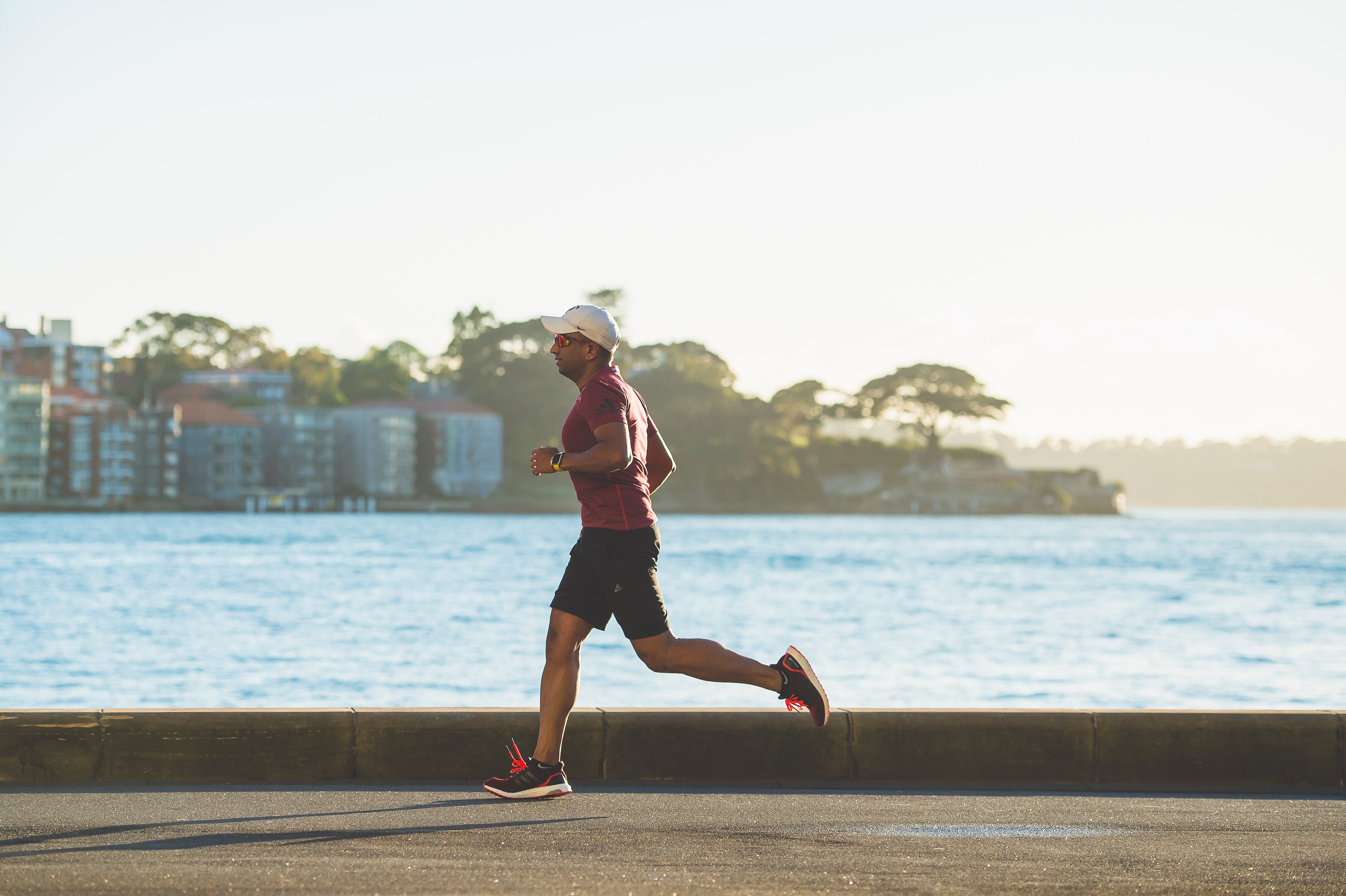 A man running along a beach