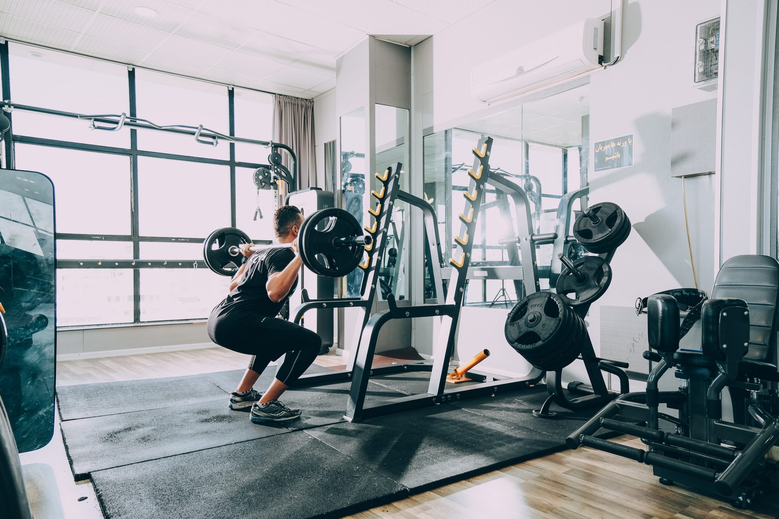 A guy working out in a gym.